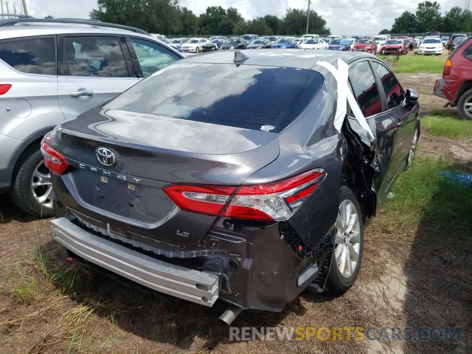 4 Photograph of a damaged car 4T1B11HK7KU843802 TOYOTA CAMRY 2019