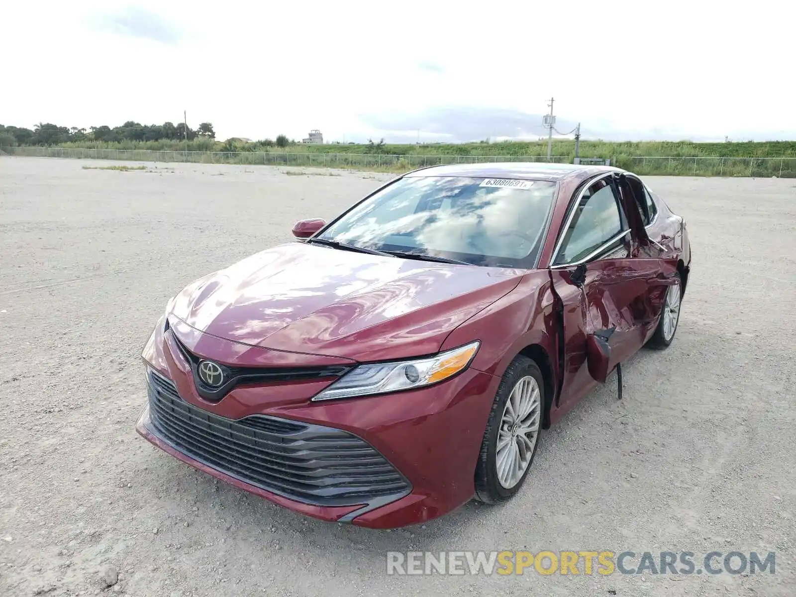 2 Photograph of a damaged car 4T1B11HK7KU844206 TOYOTA CAMRY 2019