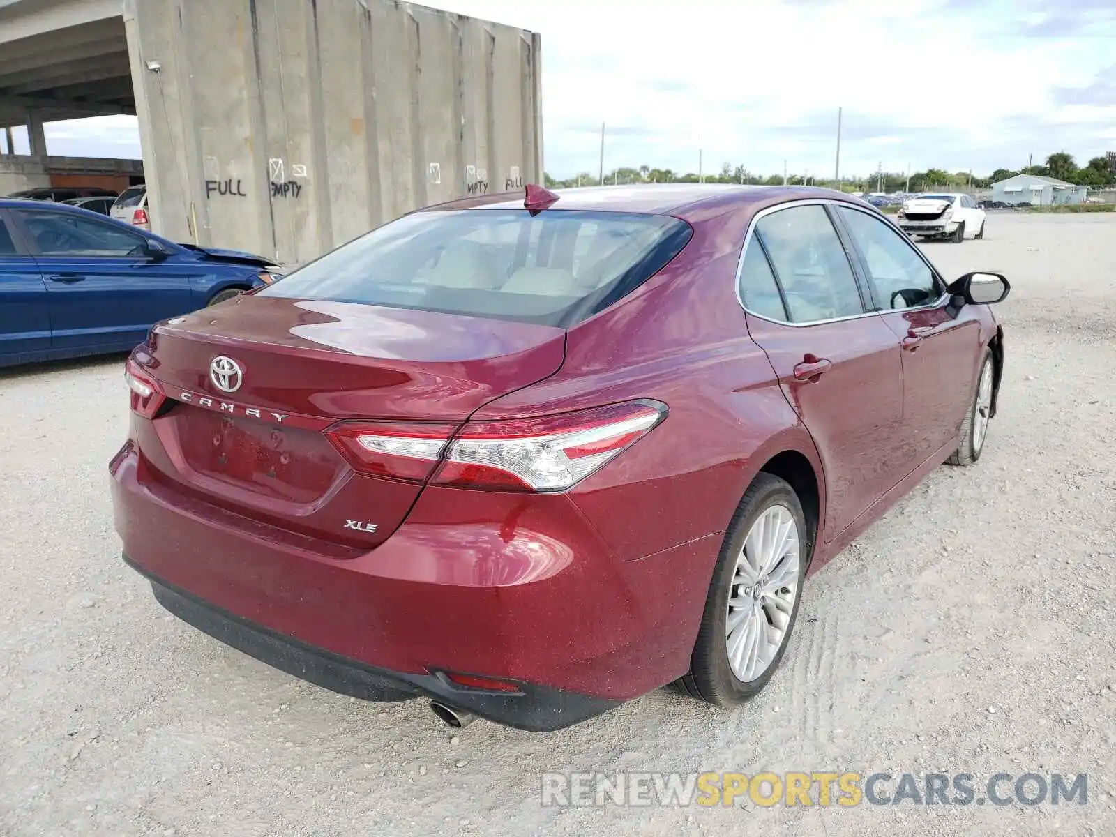 4 Photograph of a damaged car 4T1B11HK7KU844206 TOYOTA CAMRY 2019