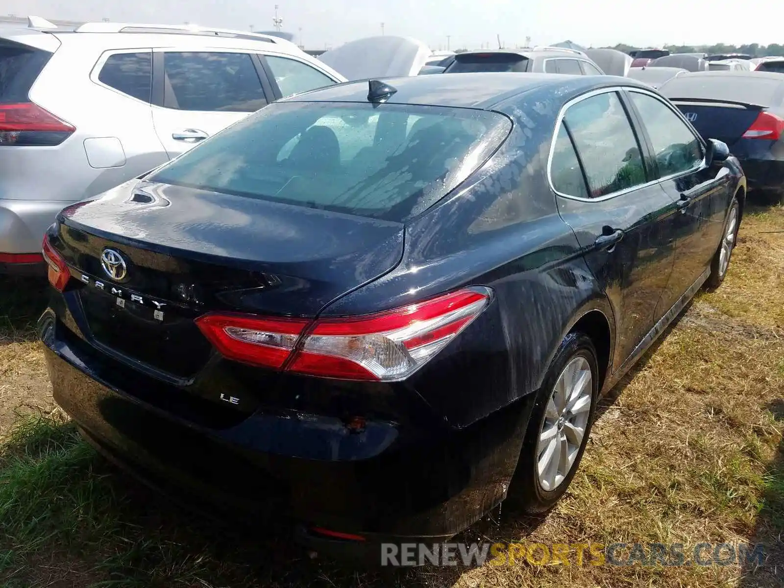 4 Photograph of a damaged car 4T1B11HK7KU844965 TOYOTA CAMRY 2019