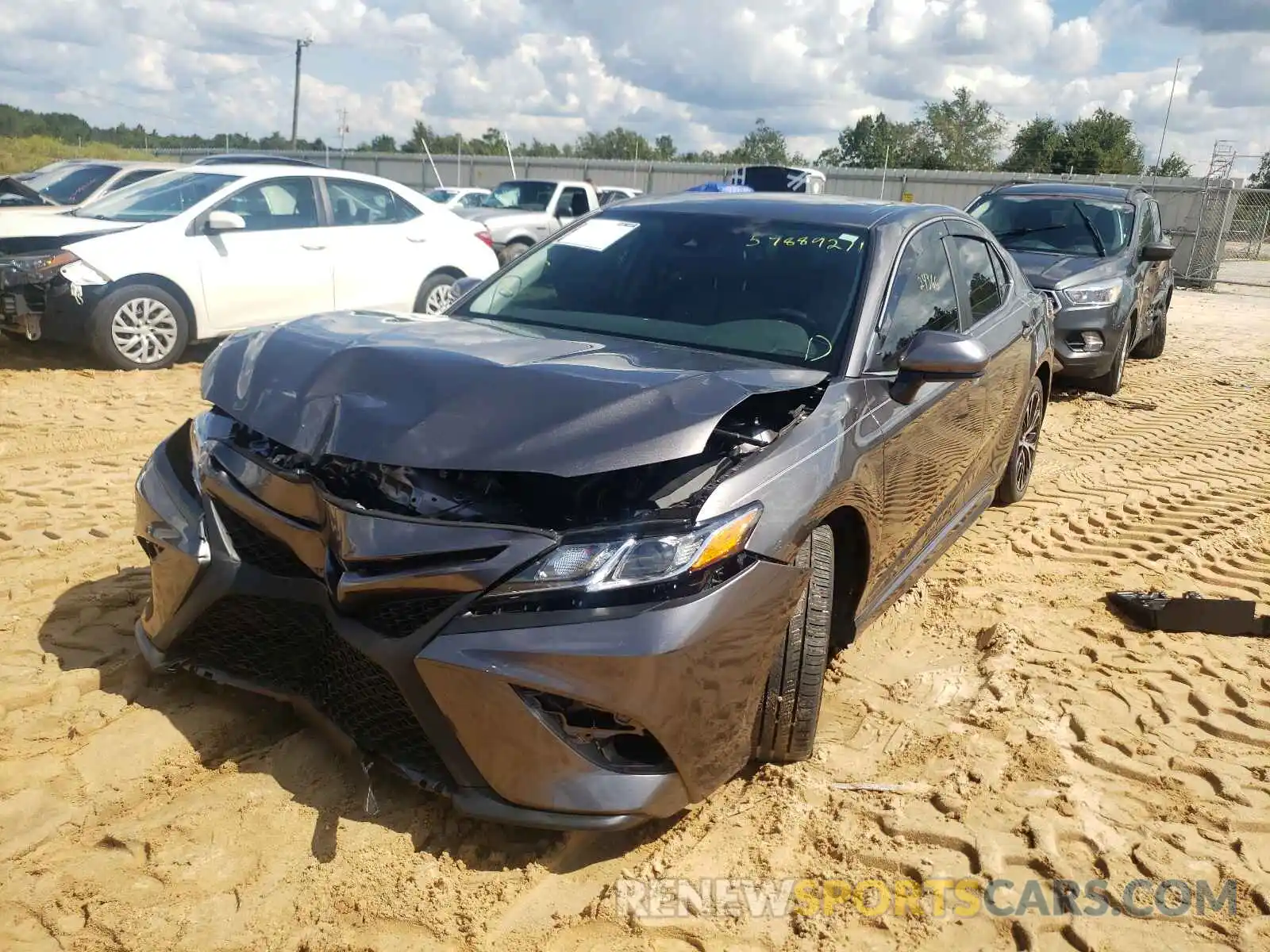 2 Photograph of a damaged car 4T1B11HK7KU847915 TOYOTA CAMRY 2019