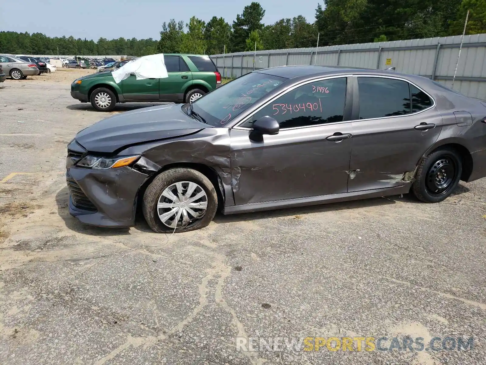 9 Photograph of a damaged car 4T1B11HK7KU856453 TOYOTA CAMRY 2019