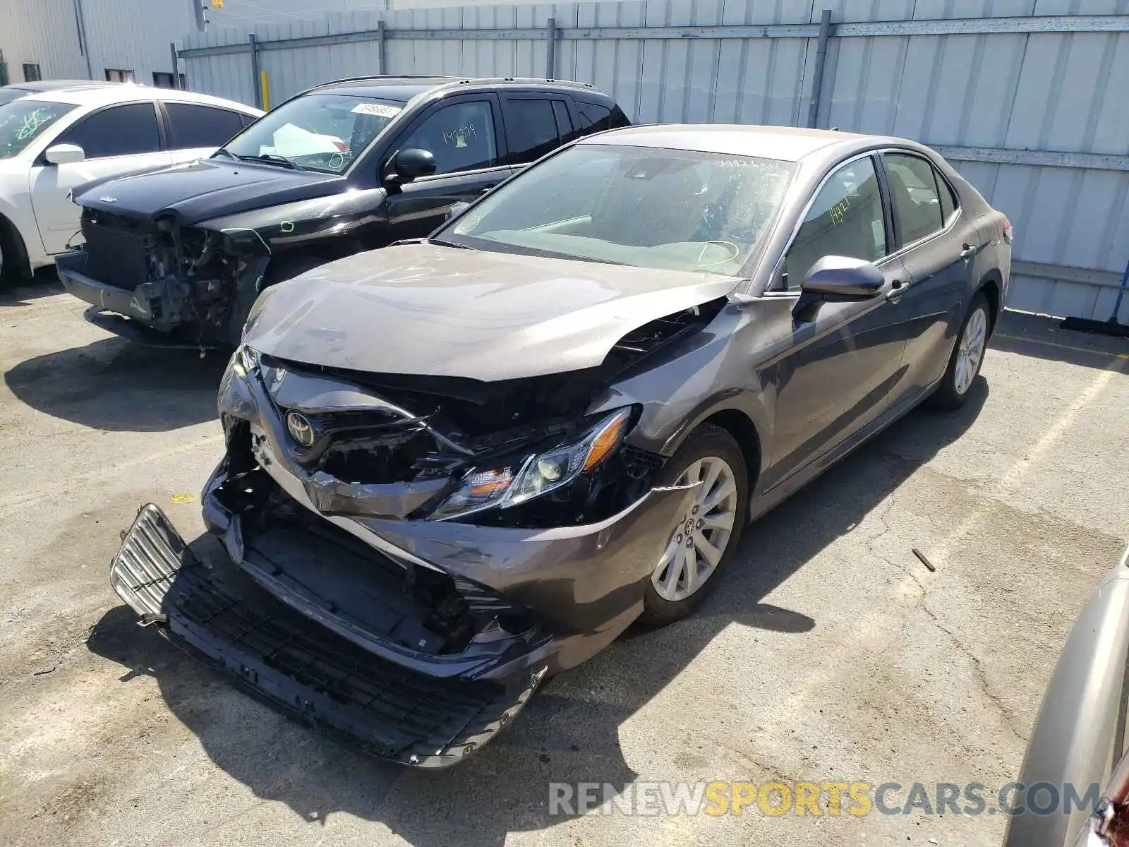 2 Photograph of a damaged car 4T1B11HK8KU168090 TOYOTA CAMRY 2019