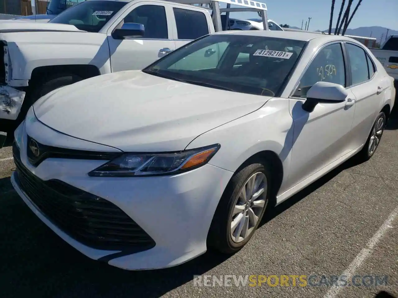 2 Photograph of a damaged car 4T1B11HK8KU176710 TOYOTA CAMRY 2019