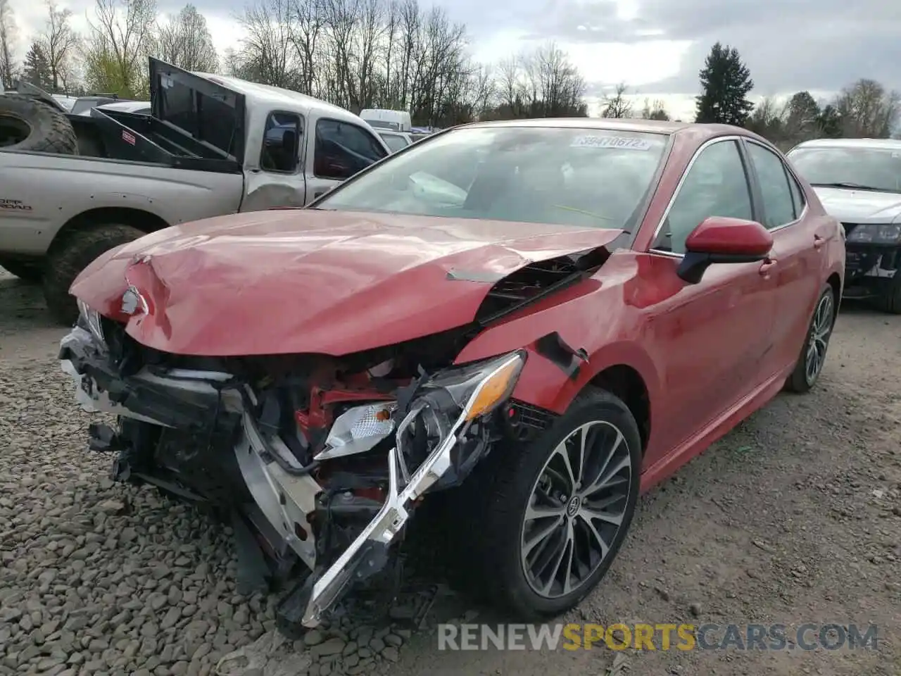 2 Photograph of a damaged car 4T1B11HK8KU182703 TOYOTA CAMRY 2019