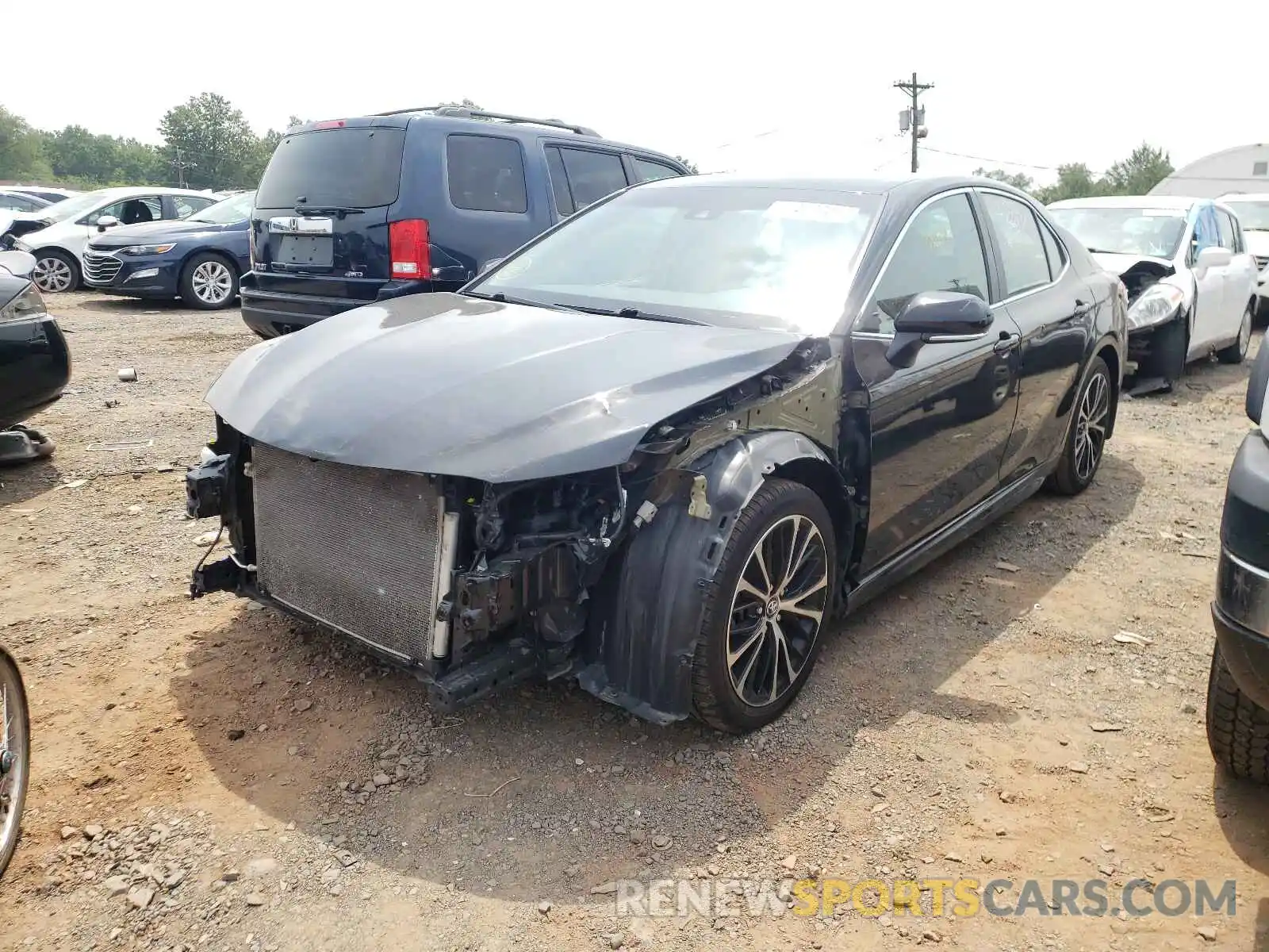 2 Photograph of a damaged car 4T1B11HK8KU207017 TOYOTA CAMRY 2019