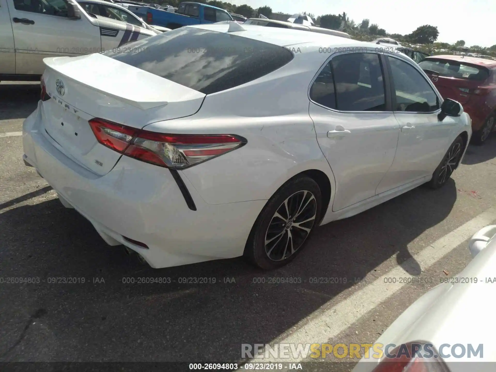 4 Photograph of a damaged car 4T1B11HK8KU207051 TOYOTA CAMRY 2019