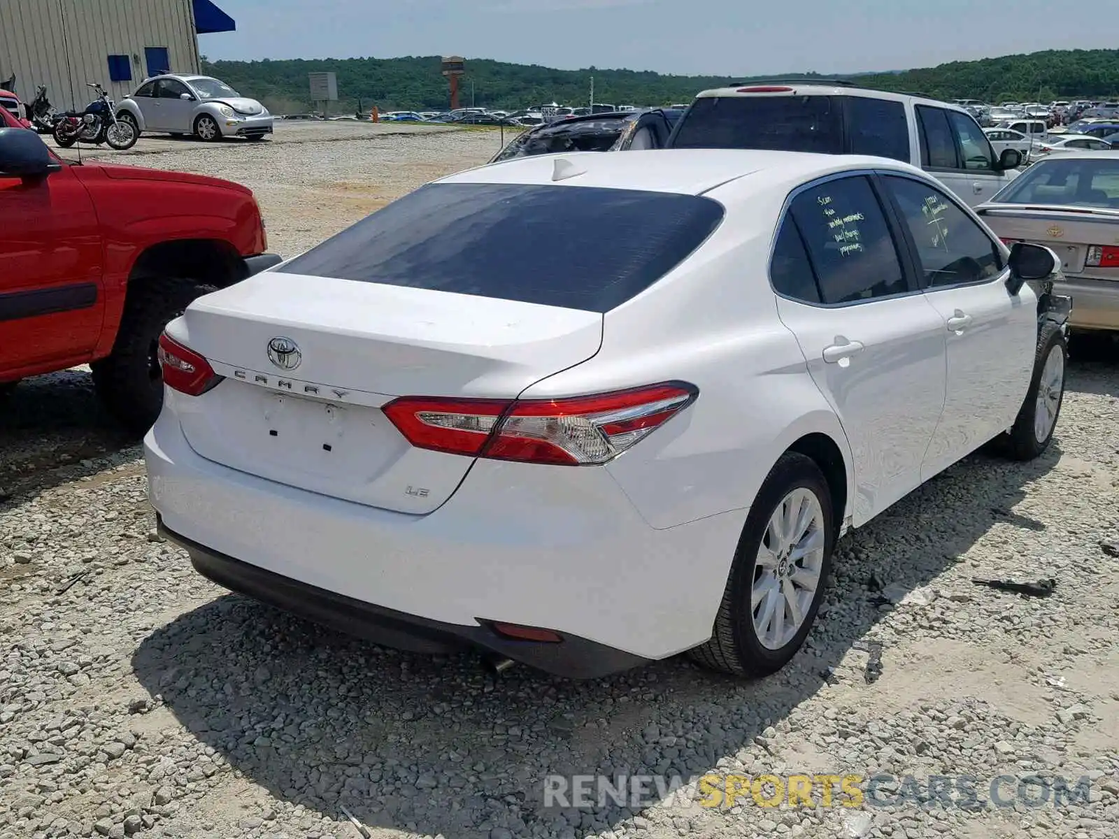 4 Photograph of a damaged car 4T1B11HK8KU211889 TOYOTA CAMRY 2019