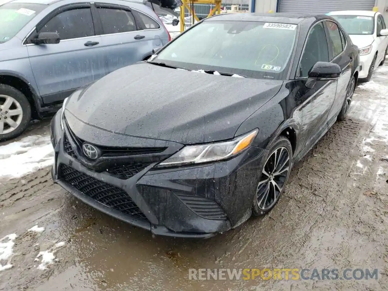 2 Photograph of a damaged car 4T1B11HK8KU212265 TOYOTA CAMRY 2019