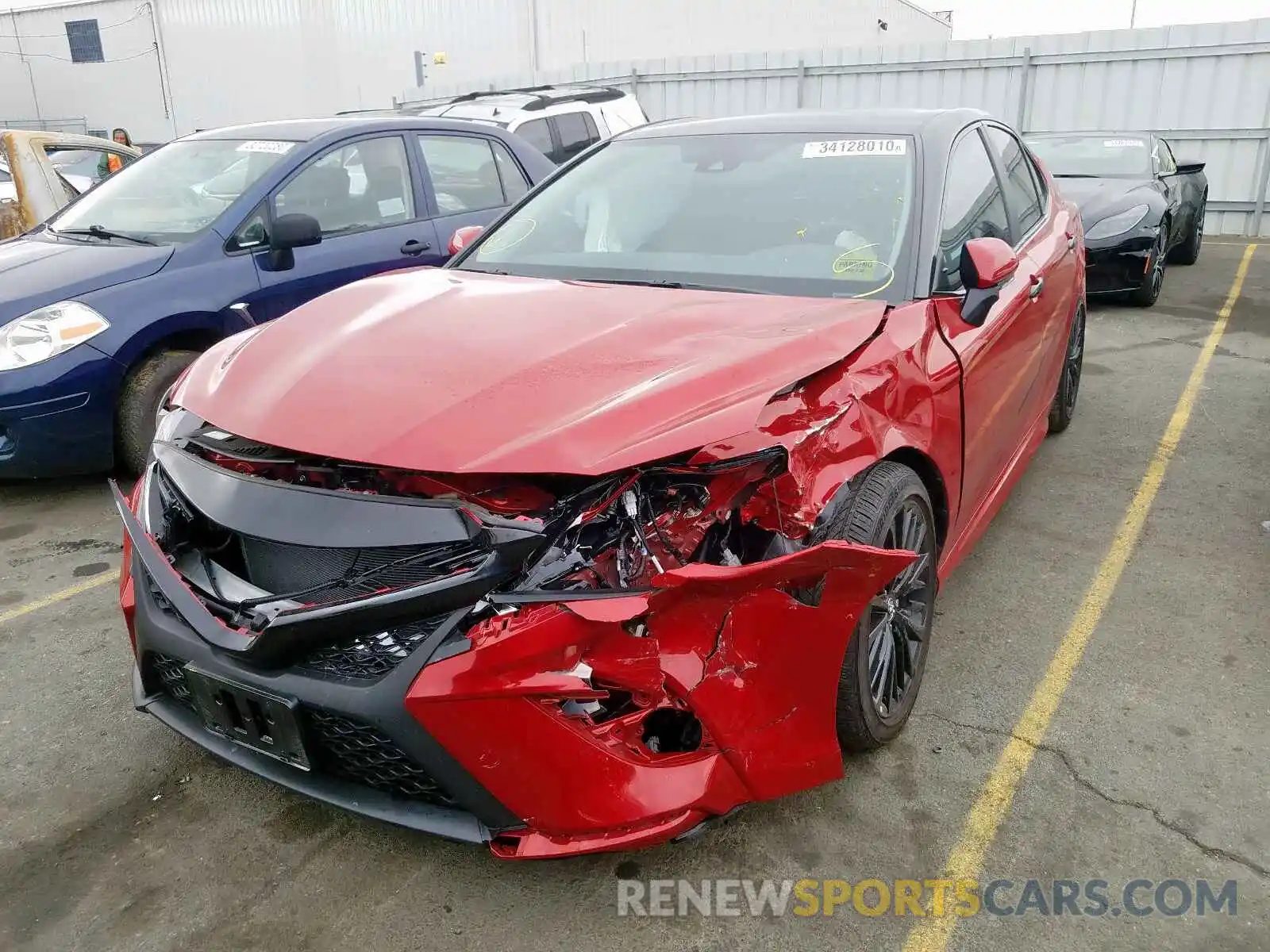 2 Photograph of a damaged car 4T1B11HK8KU214968 TOYOTA CAMRY 2019