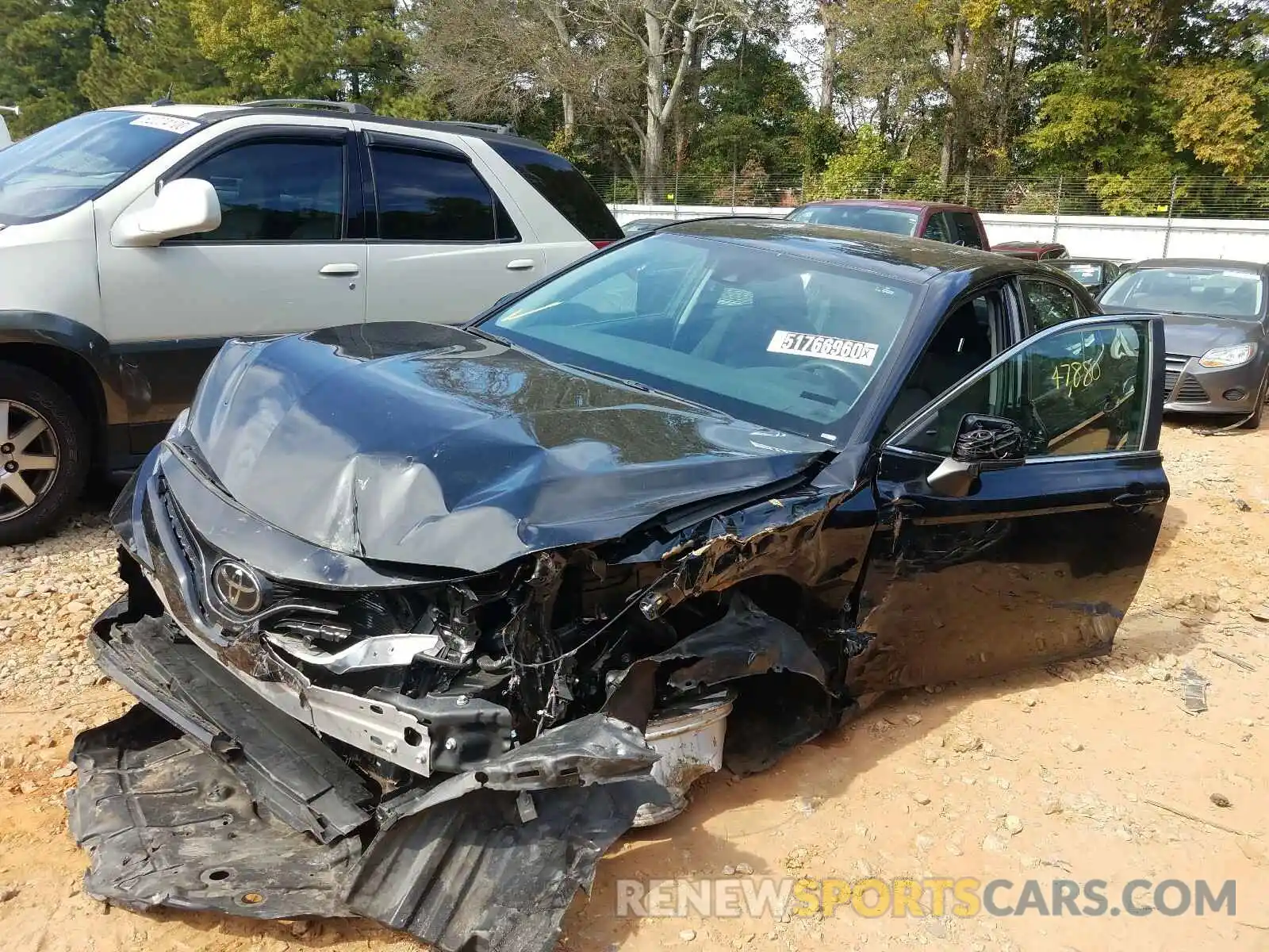 2 Photograph of a damaged car 4T1B11HK8KU215702 TOYOTA CAMRY 2019