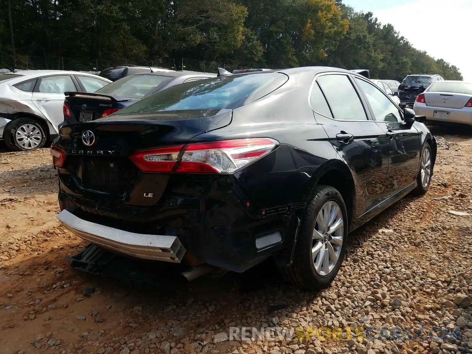 4 Photograph of a damaged car 4T1B11HK8KU215702 TOYOTA CAMRY 2019