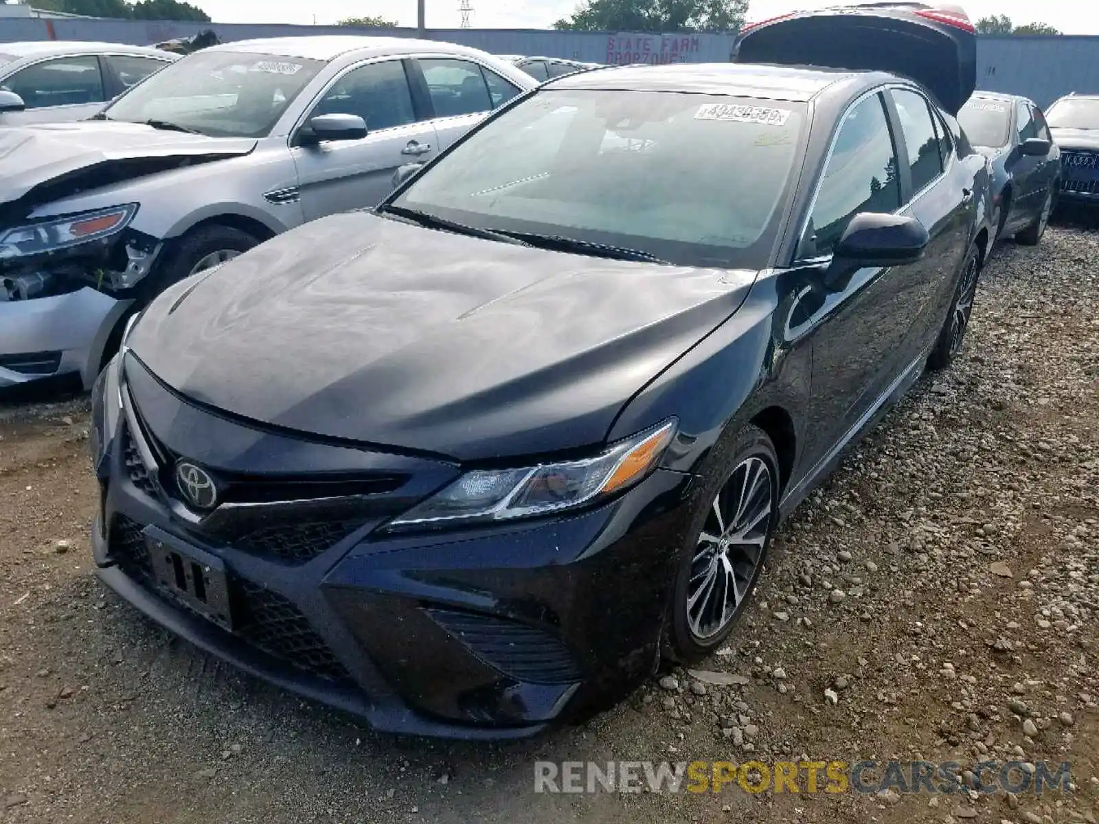 2 Photograph of a damaged car 4T1B11HK8KU215750 TOYOTA CAMRY 2019