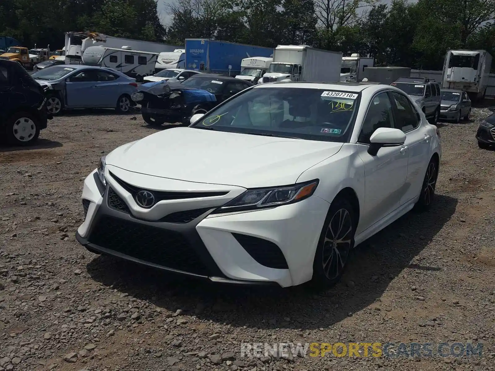 2 Photograph of a damaged car 4T1B11HK8KU224304 TOYOTA CAMRY 2019