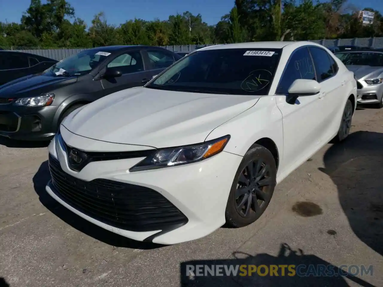 2 Photograph of a damaged car 4T1B11HK8KU231219 TOYOTA CAMRY 2019