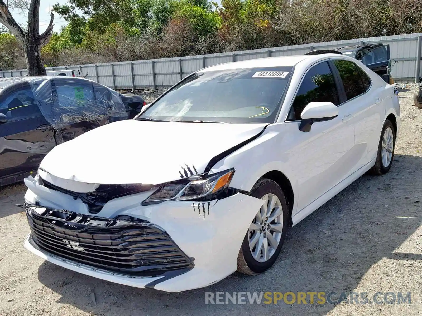 2 Photograph of a damaged car 4T1B11HK8KU233181 TOYOTA CAMRY 2019