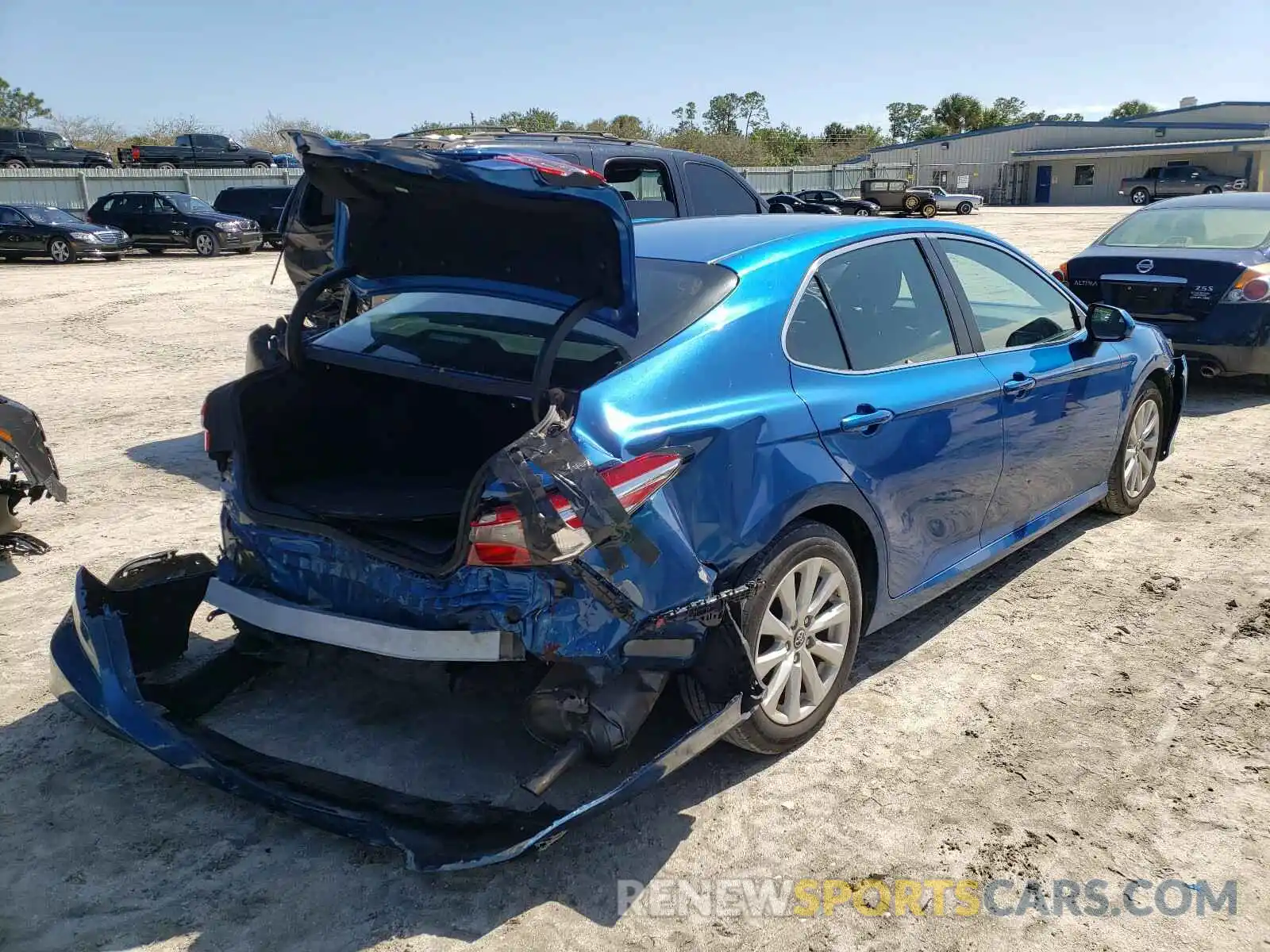 4 Photograph of a damaged car 4T1B11HK8KU236694 TOYOTA CAMRY 2019