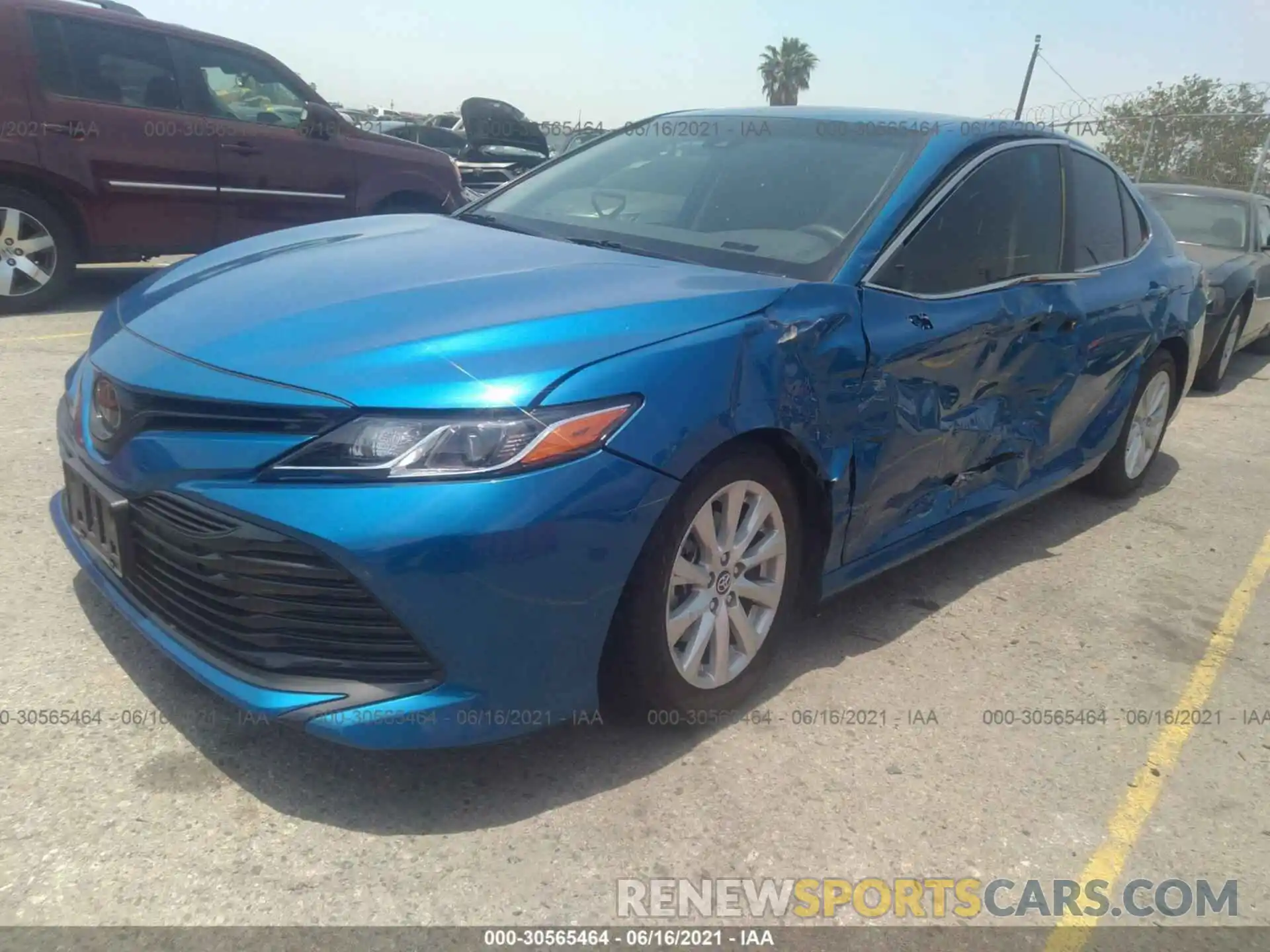 2 Photograph of a damaged car 4T1B11HK8KU237019 TOYOTA CAMRY 2019