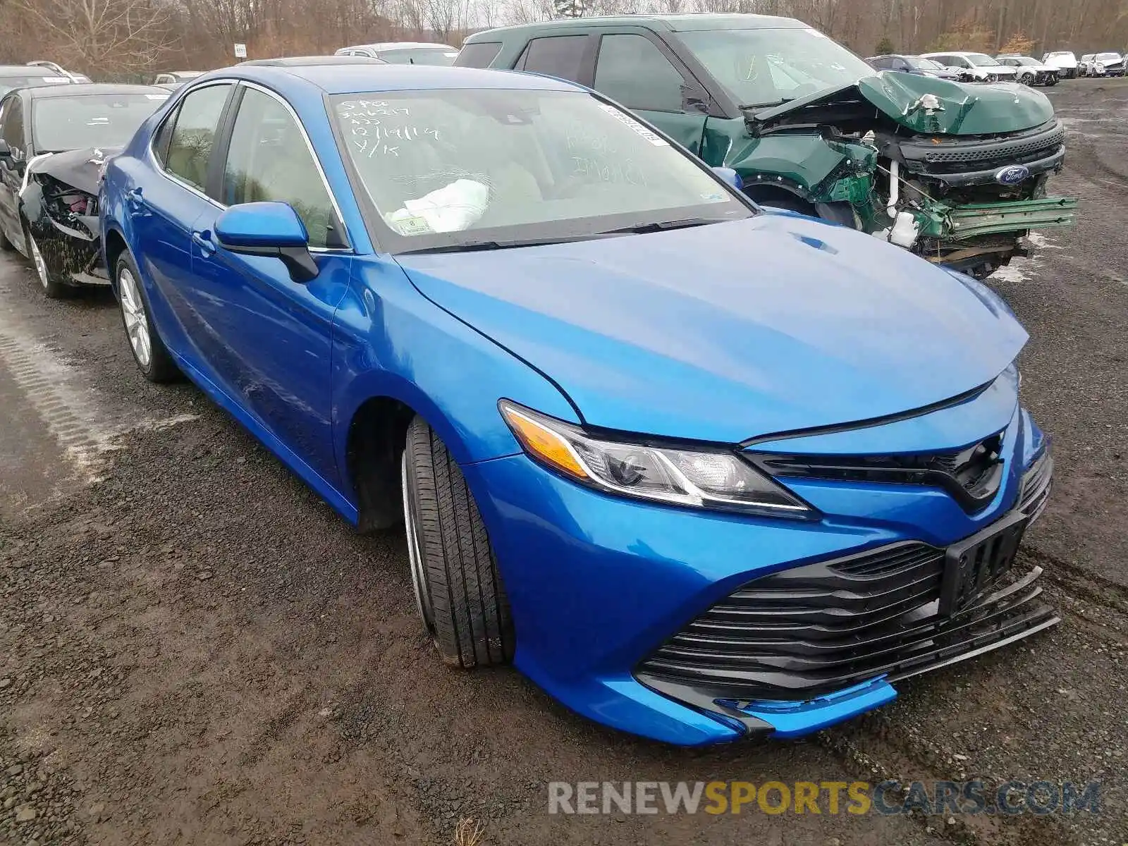 1 Photograph of a damaged car 4T1B11HK8KU243547 TOYOTA CAMRY 2019