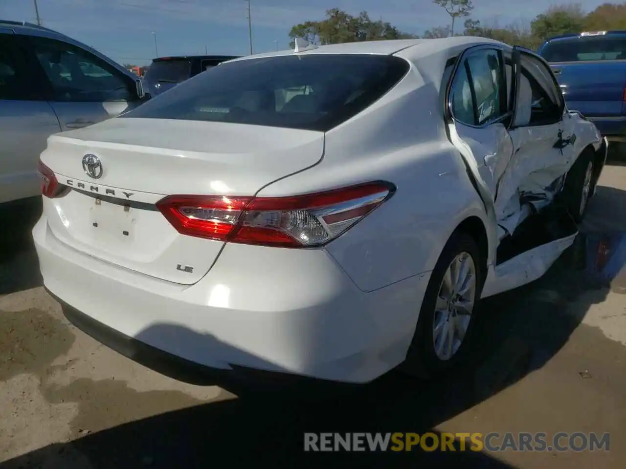 4 Photograph of a damaged car 4T1B11HK8KU257805 TOYOTA CAMRY 2019