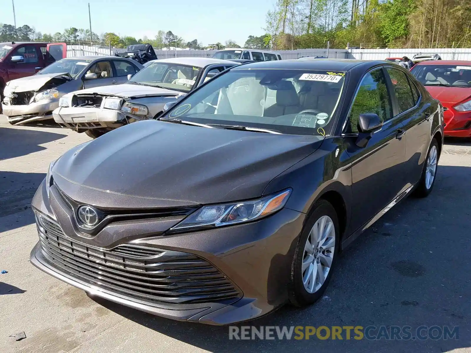 2 Photograph of a damaged car 4T1B11HK8KU261563 TOYOTA CAMRY 2019