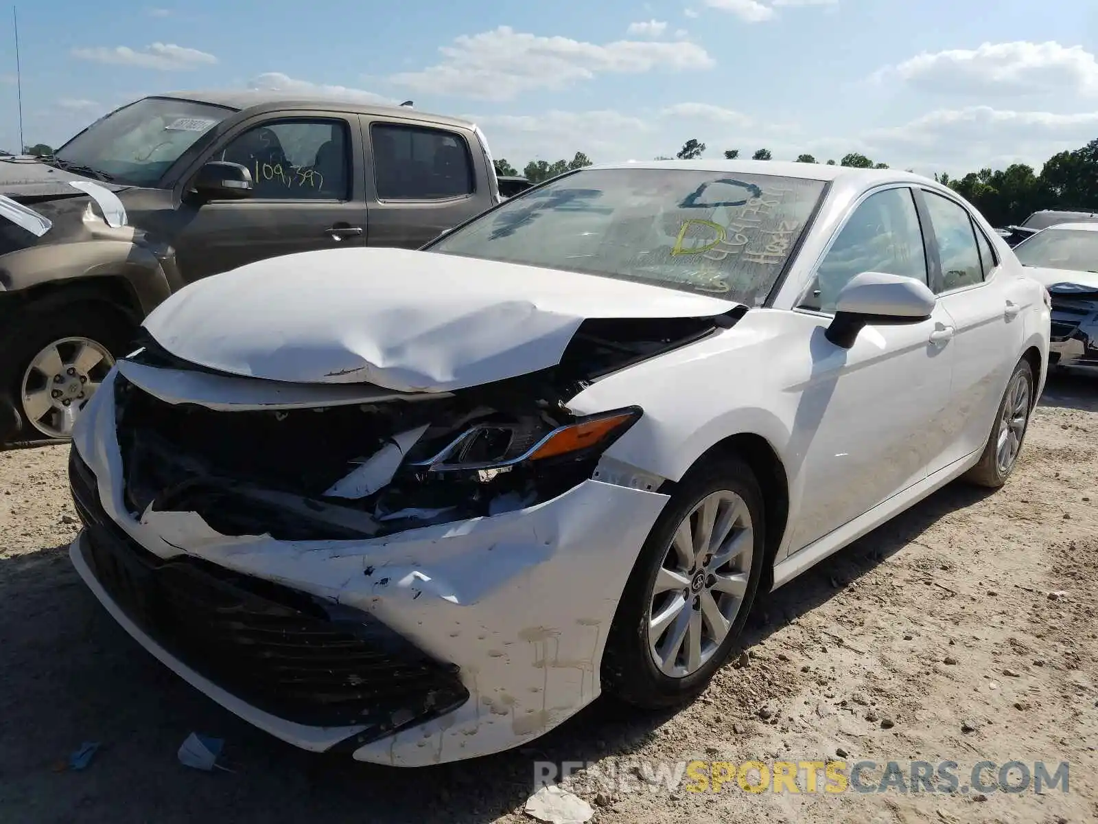 2 Photograph of a damaged car 4T1B11HK8KU263118 TOYOTA CAMRY 2019