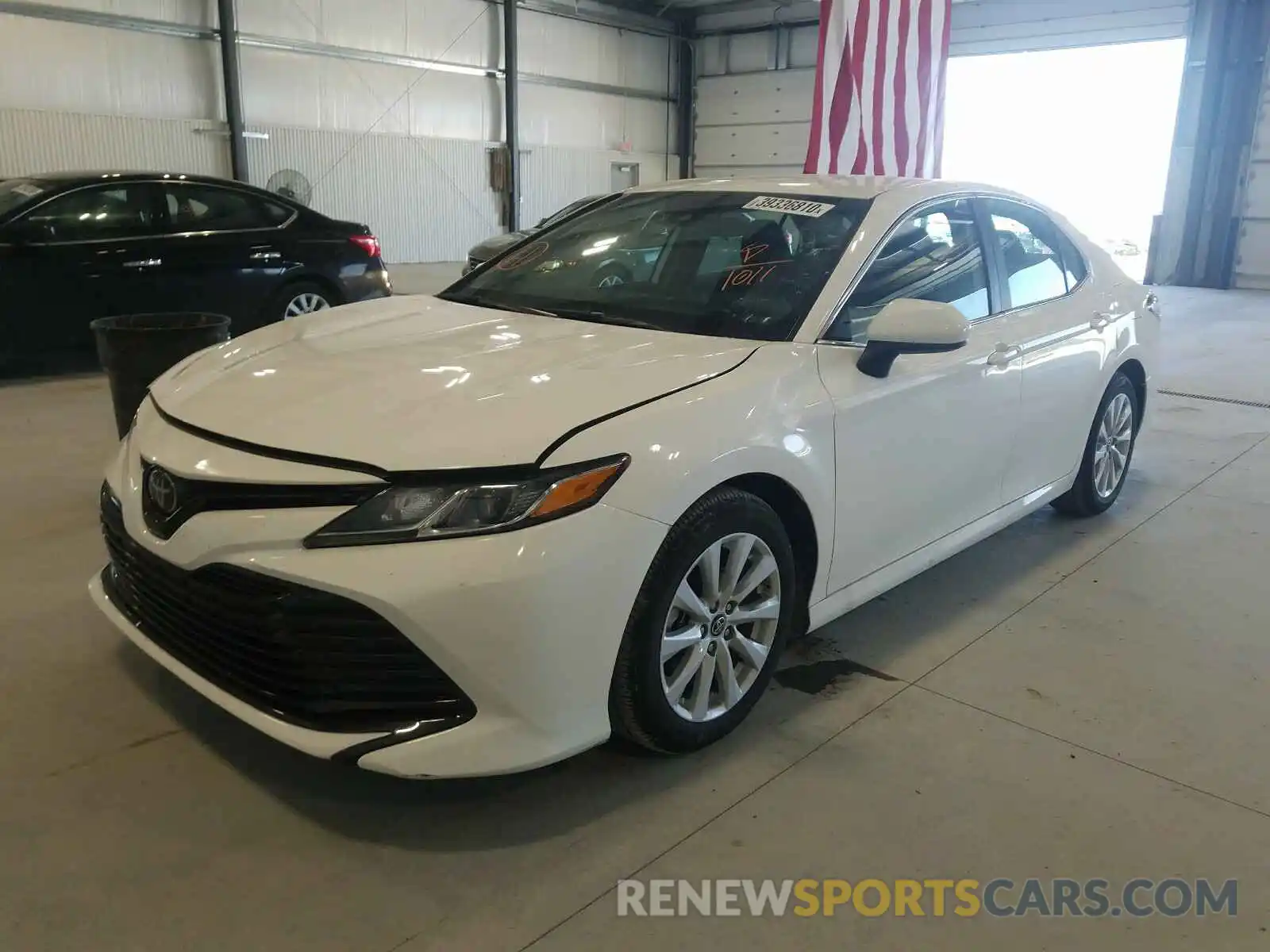 2 Photograph of a damaged car 4T1B11HK8KU271011 TOYOTA CAMRY 2019