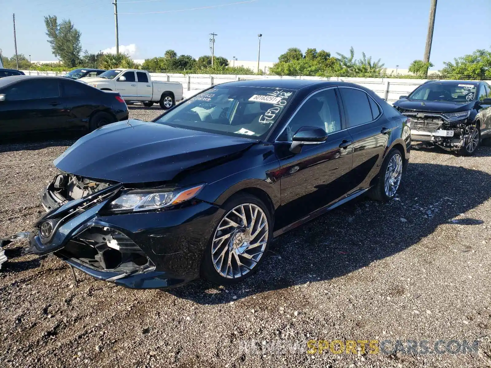 2 Photograph of a damaged car 4T1B11HK8KU291842 TOYOTA CAMRY 2019