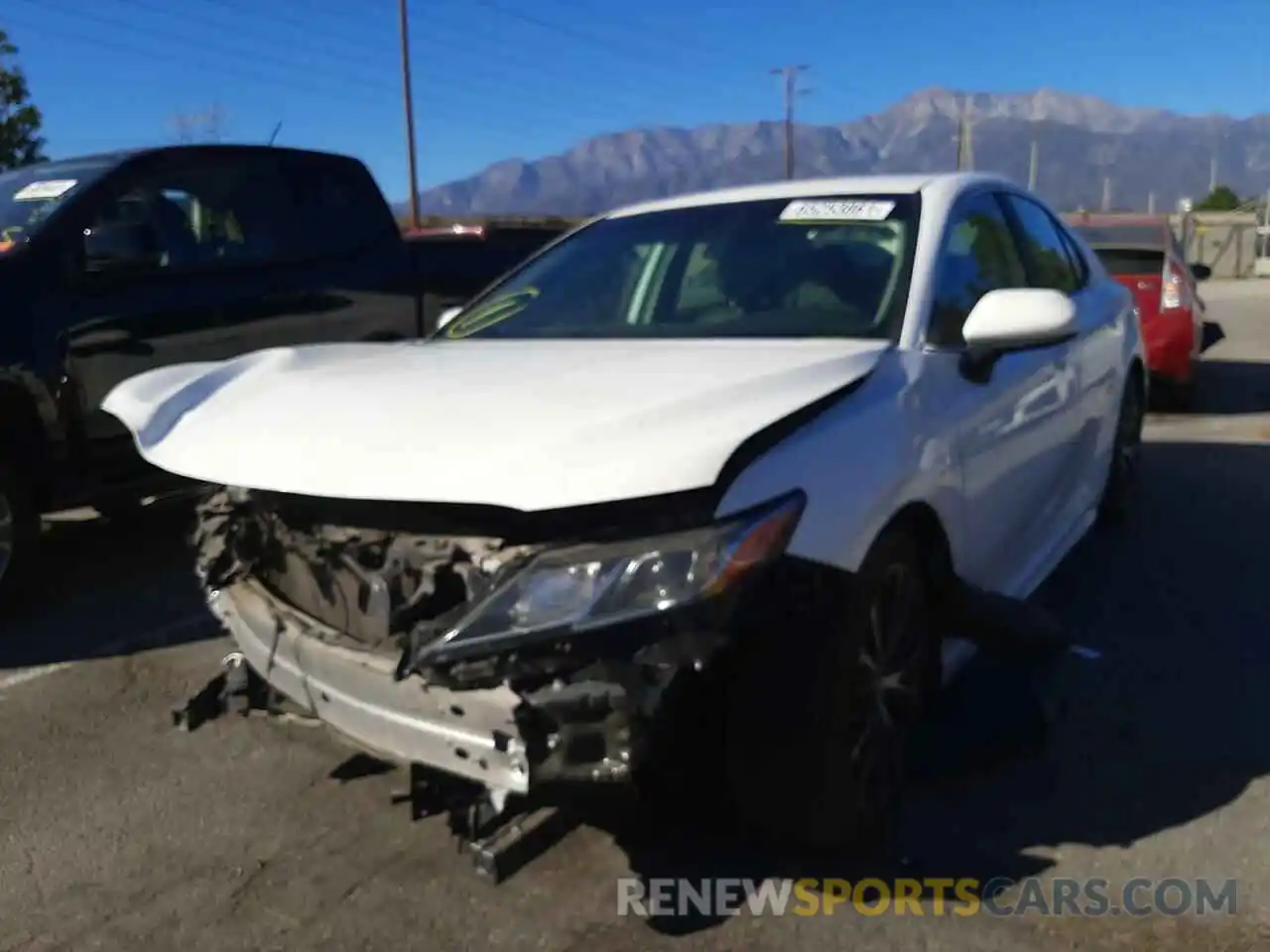 2 Photograph of a damaged car 4T1B11HK8KU679198 TOYOTA CAMRY 2019