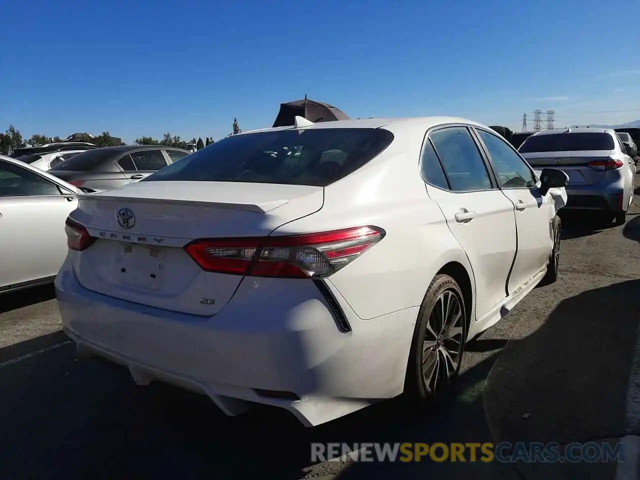 4 Photograph of a damaged car 4T1B11HK8KU679198 TOYOTA CAMRY 2019