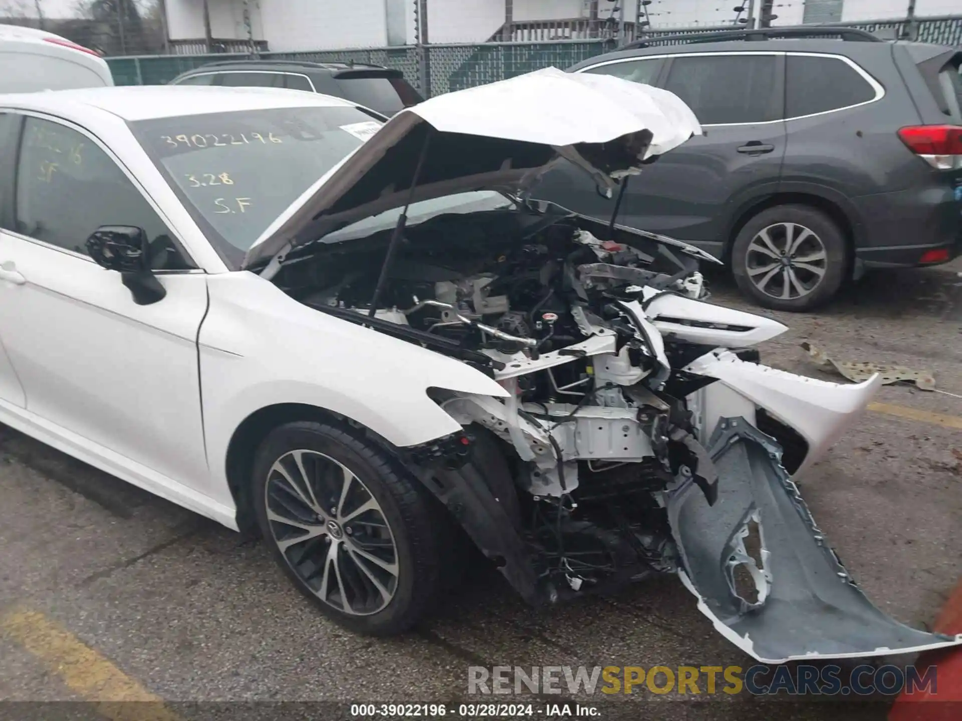 19 Photograph of a damaged car 4T1B11HK8KU680979 TOYOTA CAMRY 2019