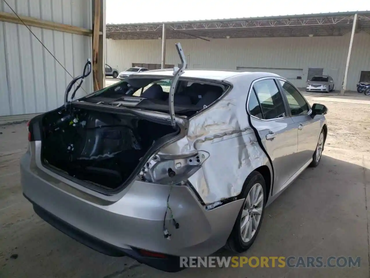 4 Photograph of a damaged car 4T1B11HK8KU686040 TOYOTA CAMRY 2019