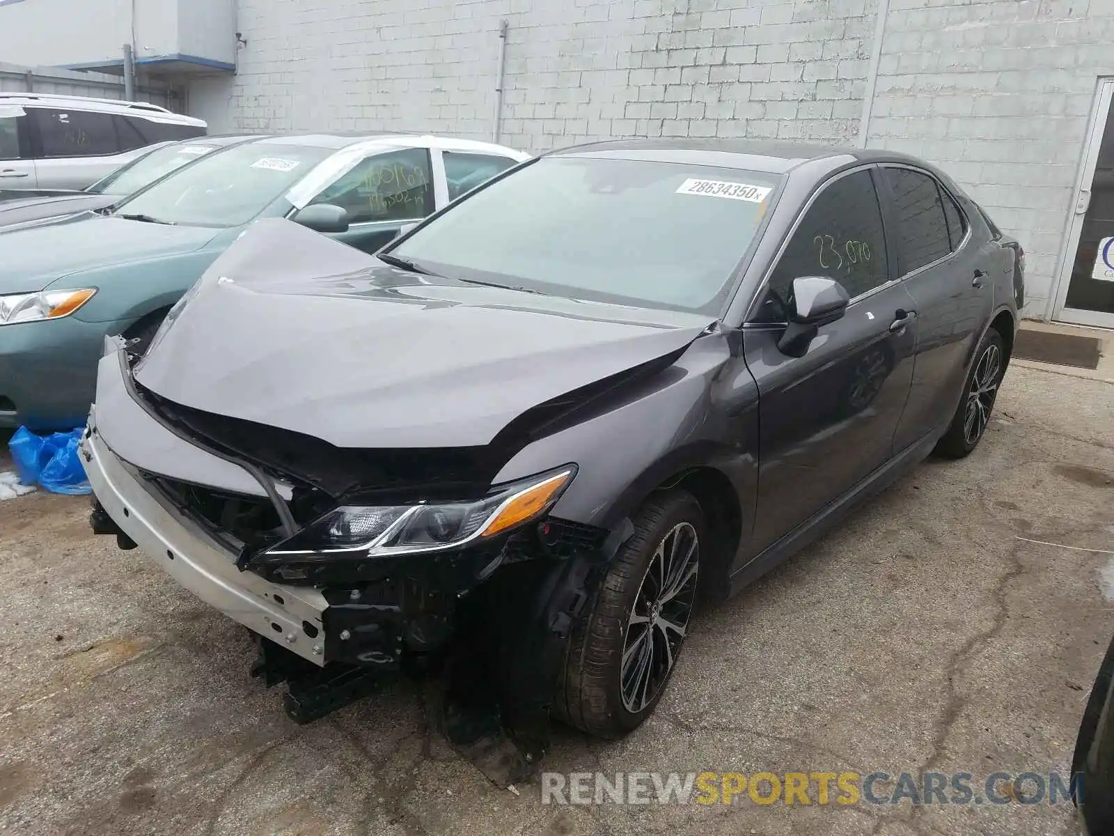 2 Photograph of a damaged car 4T1B11HK8KU691335 TOYOTA CAMRY 2019