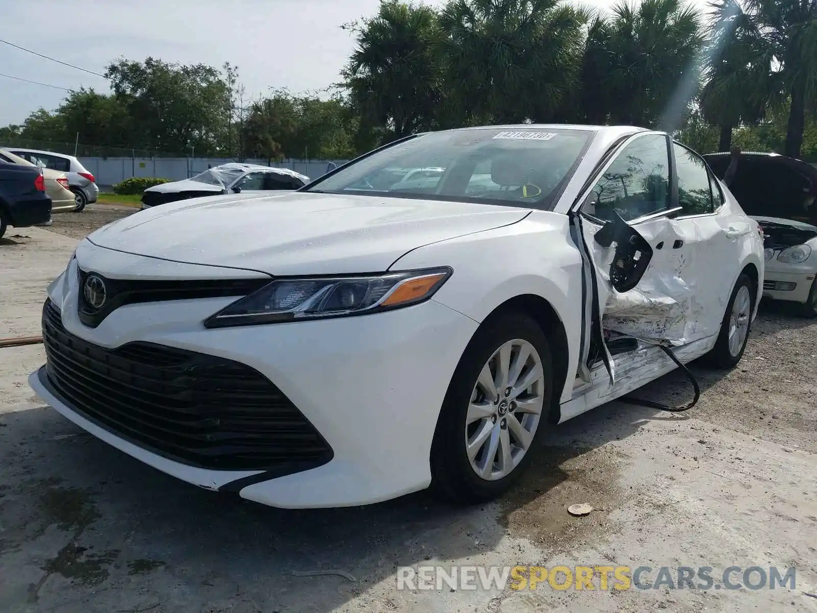 2 Photograph of a damaged car 4T1B11HK8KU694462 TOYOTA CAMRY 2019