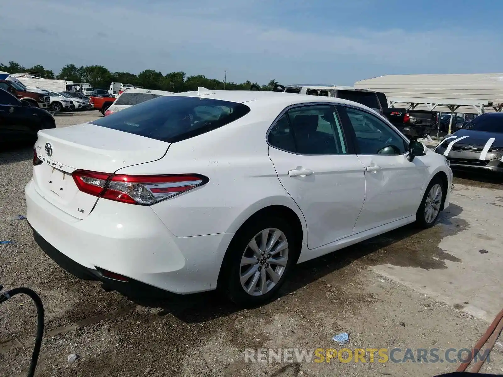 4 Photograph of a damaged car 4T1B11HK8KU694462 TOYOTA CAMRY 2019