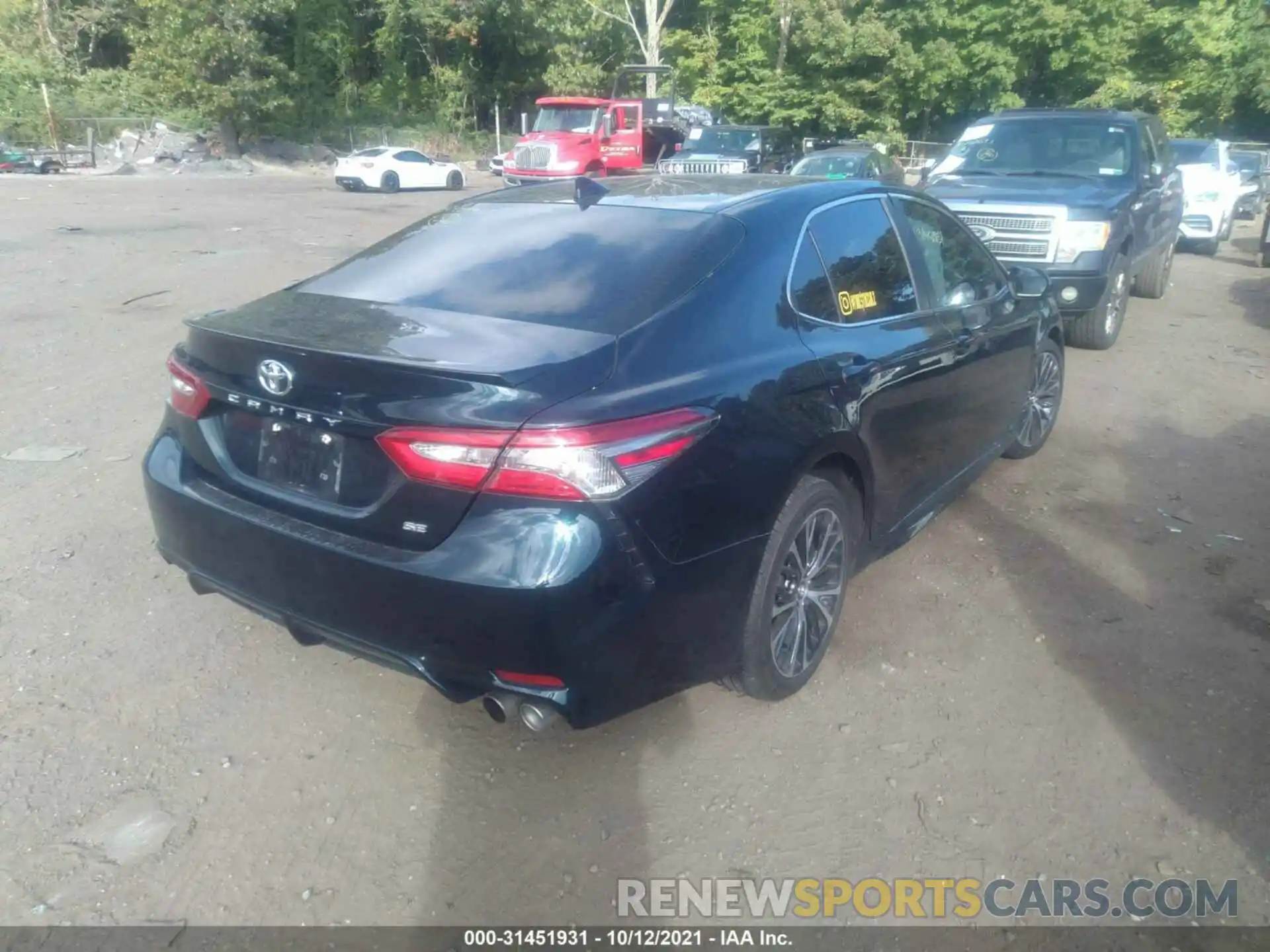 4 Photograph of a damaged car 4T1B11HK8KU702138 TOYOTA CAMRY 2019