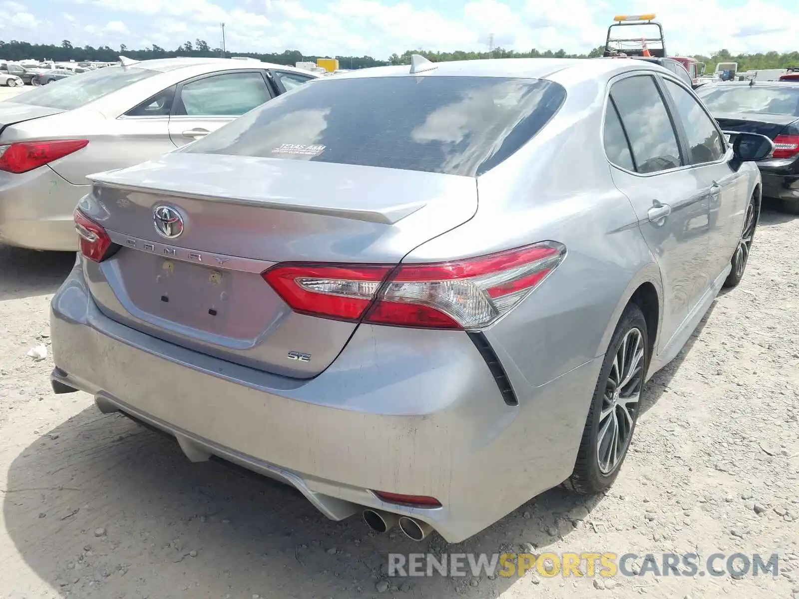 4 Photograph of a damaged car 4T1B11HK8KU702513 TOYOTA CAMRY 2019