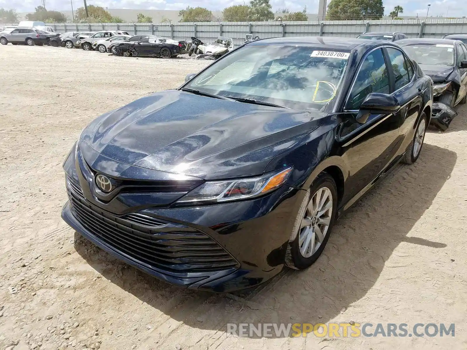 2 Photograph of a damaged car 4T1B11HK8KU703497 TOYOTA CAMRY 2019