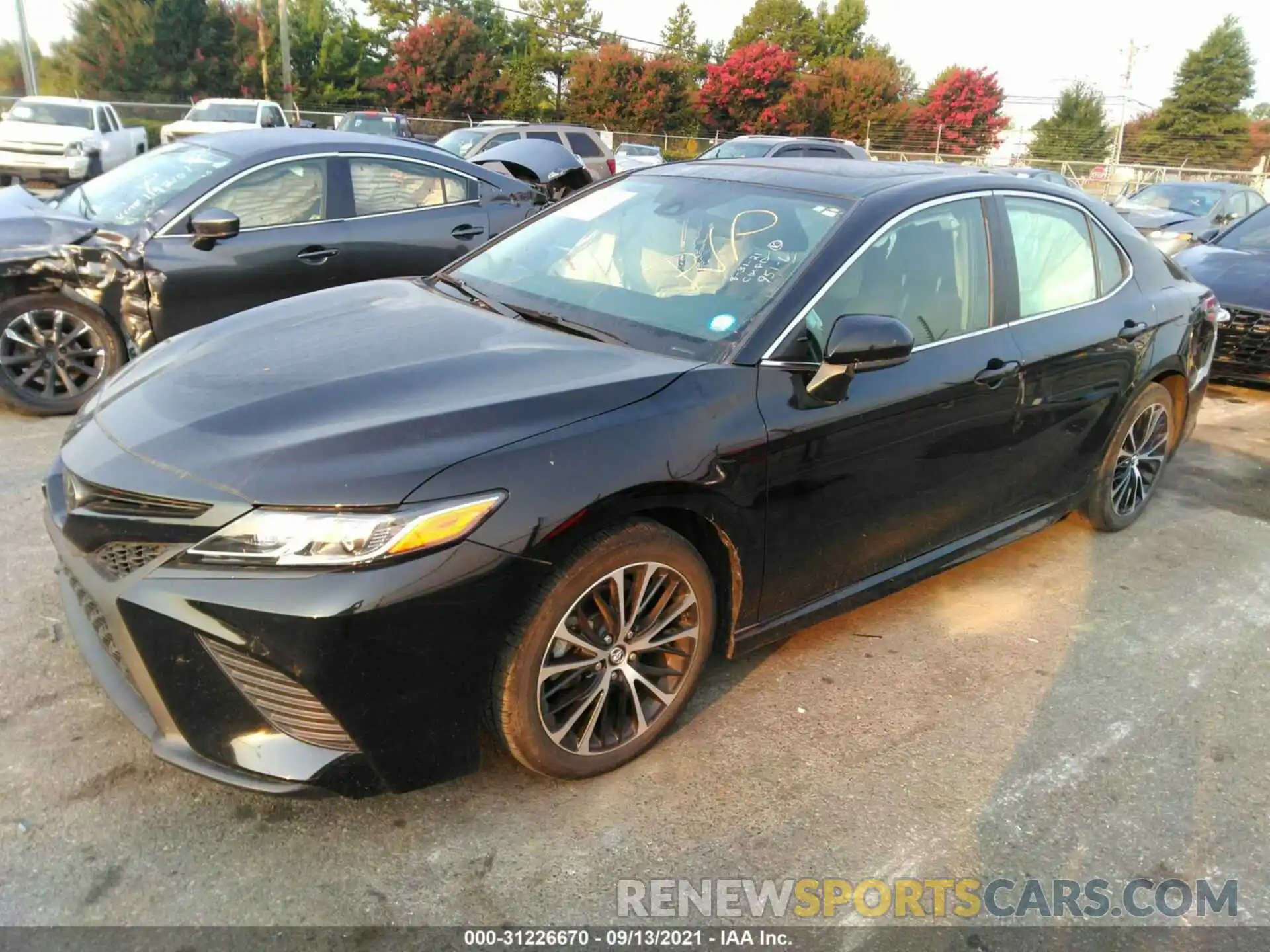 2 Photograph of a damaged car 4T1B11HK8KU704200 TOYOTA CAMRY 2019