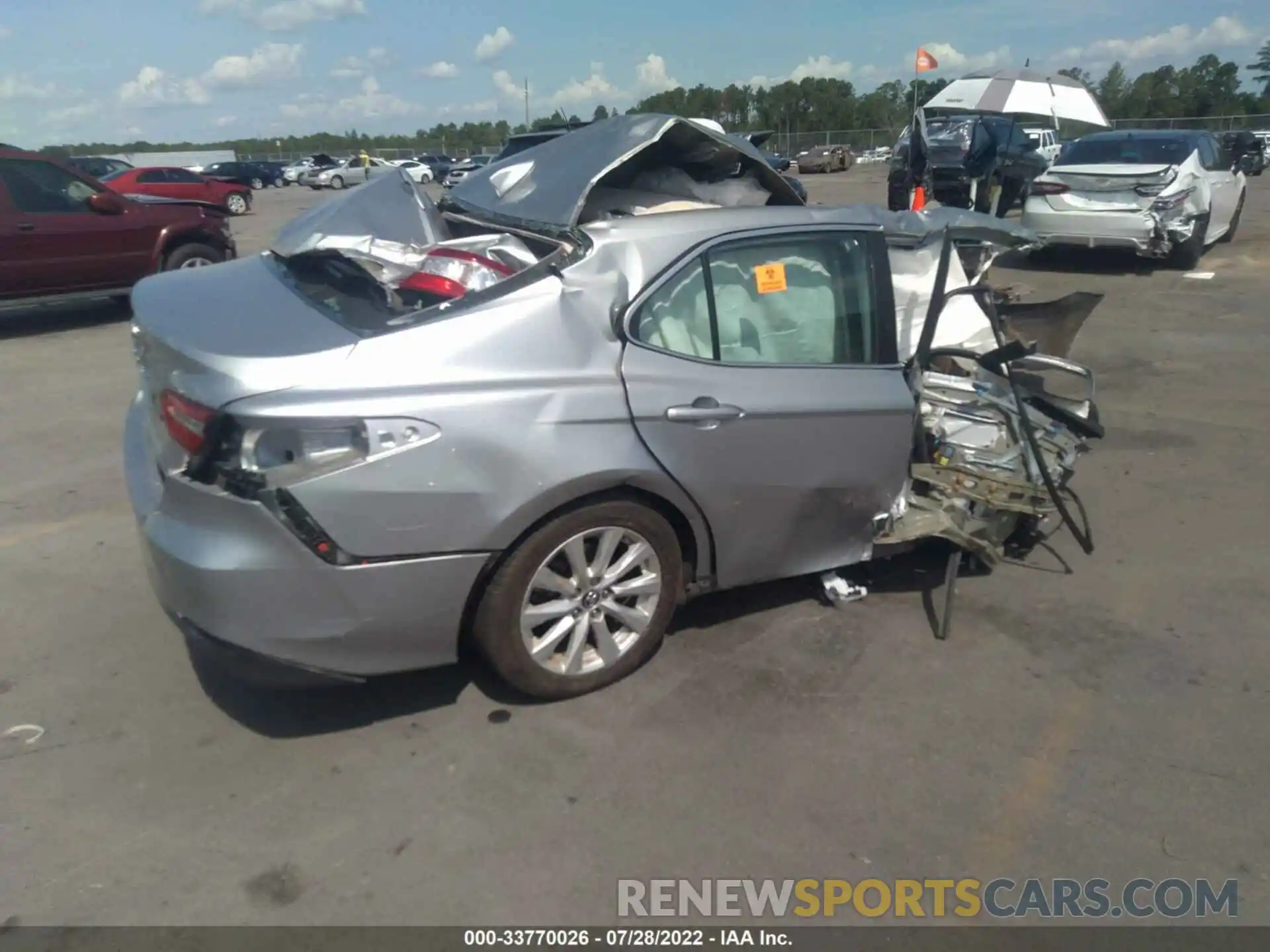 4 Photograph of a damaged car 4T1B11HK8KU706982 TOYOTA CAMRY 2019