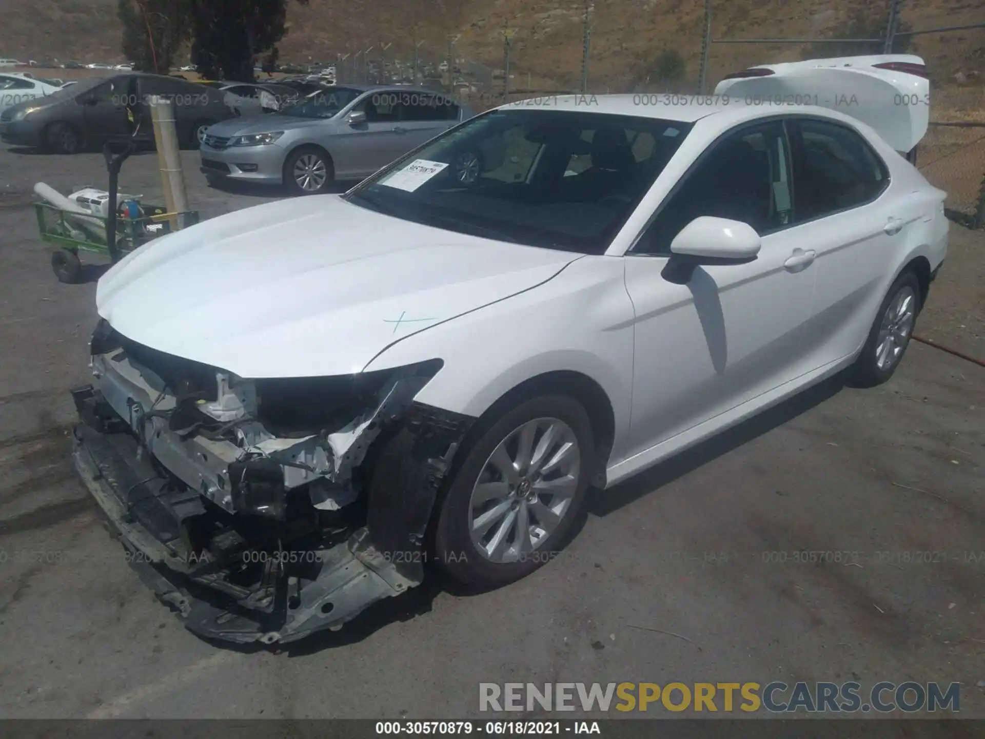 2 Photograph of a damaged car 4T1B11HK8KU714192 TOYOTA CAMRY 2019