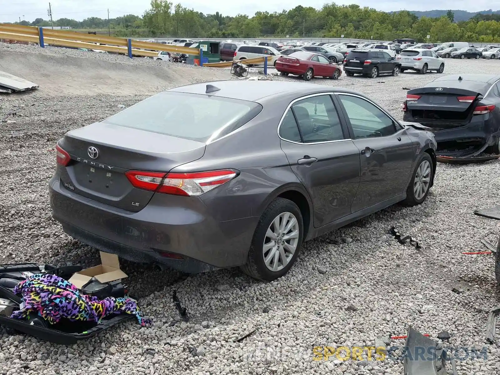 4 Photograph of a damaged car 4T1B11HK8KU716671 TOYOTA CAMRY 2019