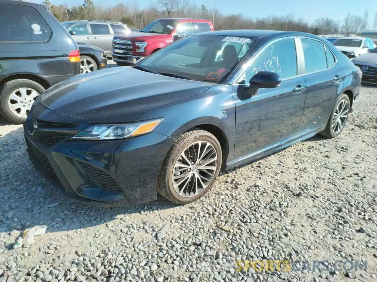 2 Photograph of a damaged car 4T1B11HK8KU717092 TOYOTA CAMRY 2019