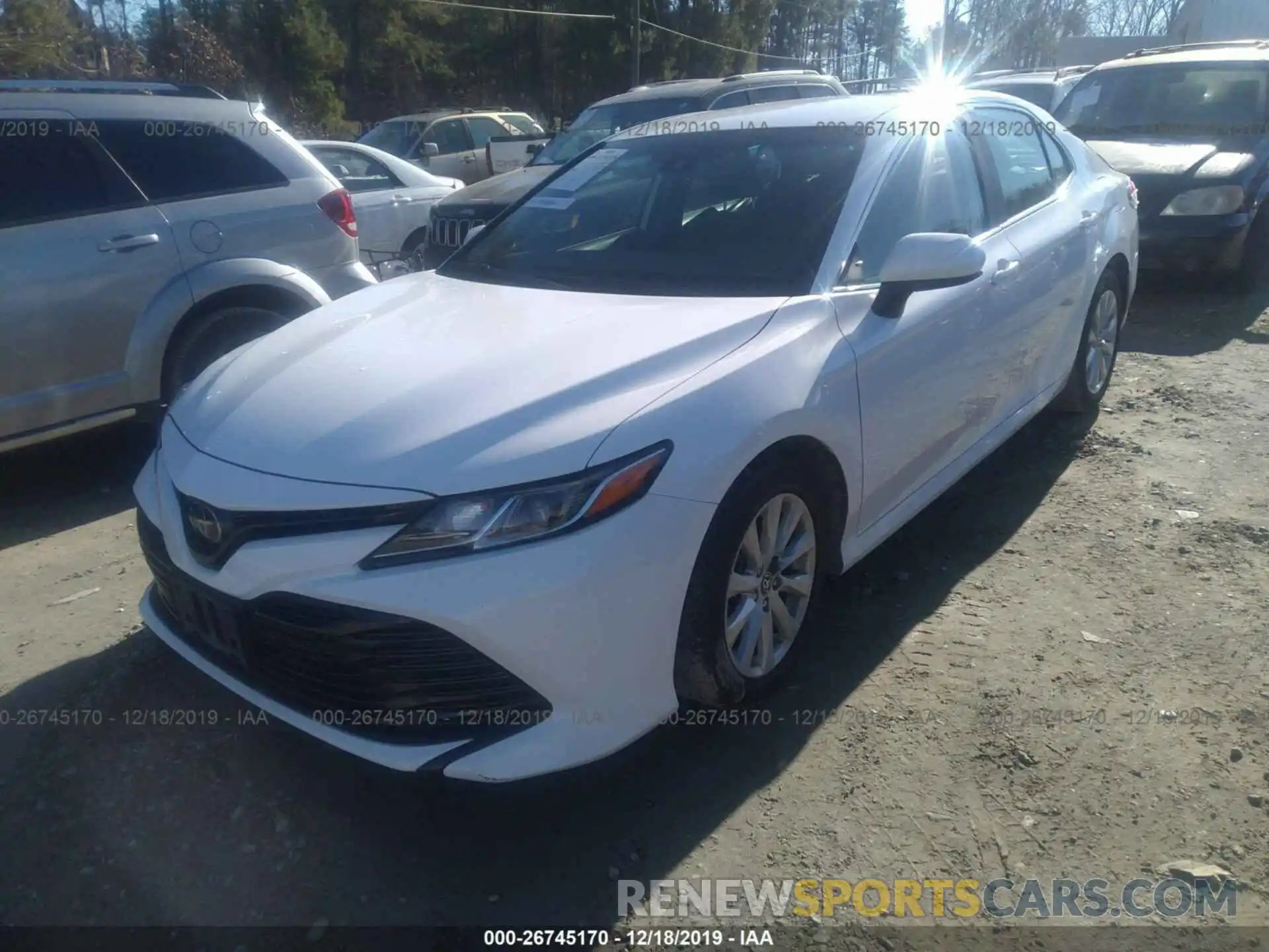 2 Photograph of a damaged car 4T1B11HK8KU718565 TOYOTA CAMRY 2019