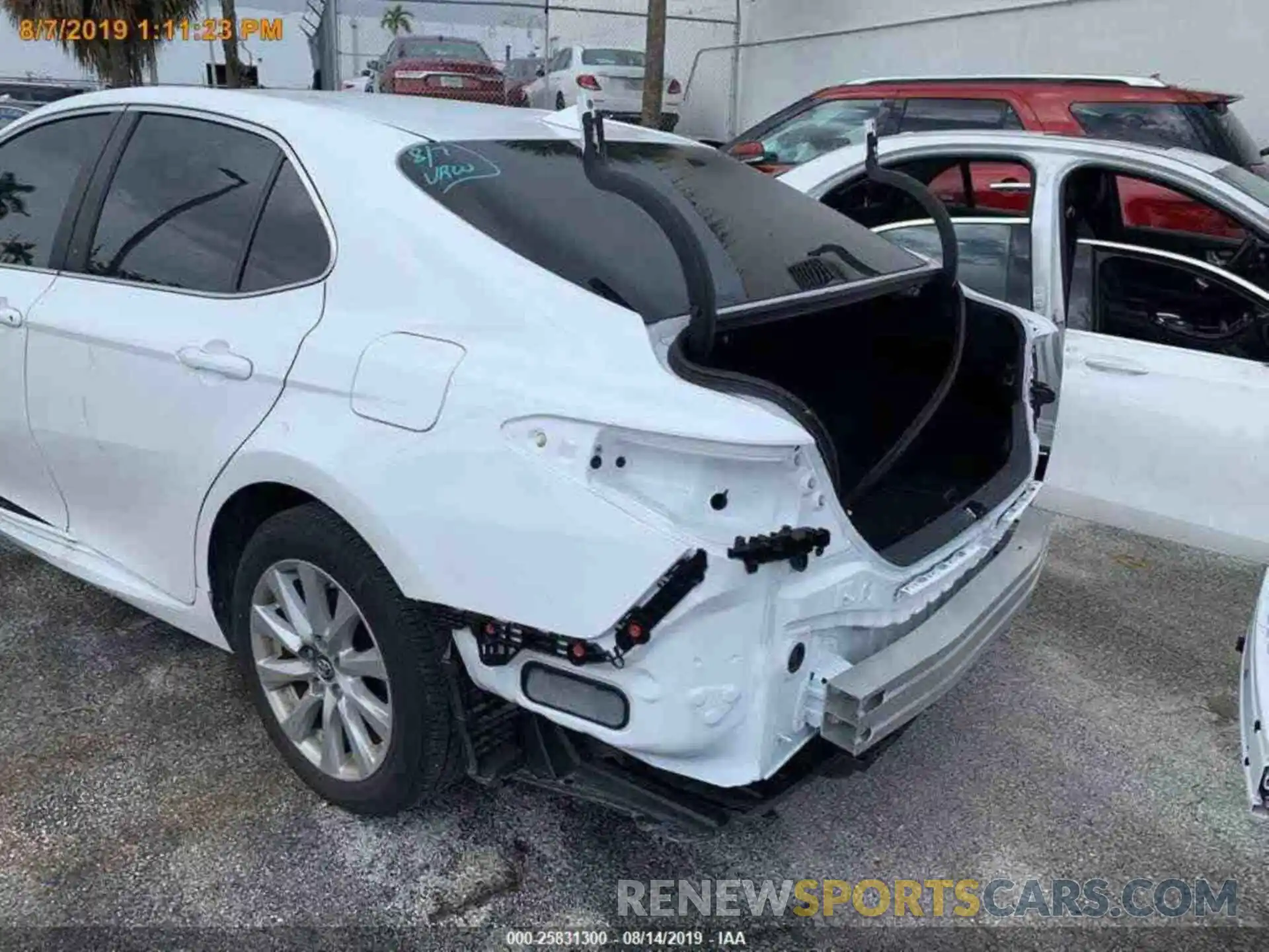 12 Photograph of a damaged car 4T1B11HK8KU719358 TOYOTA CAMRY 2019