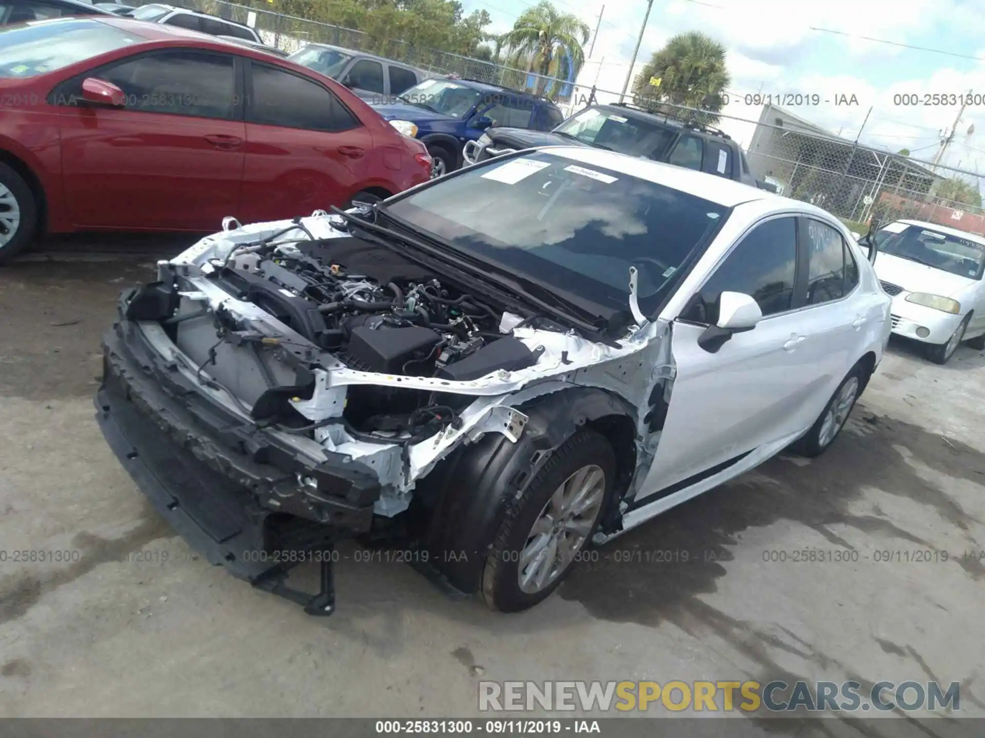 2 Photograph of a damaged car 4T1B11HK8KU719358 TOYOTA CAMRY 2019