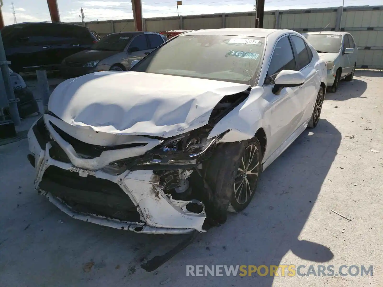 2 Photograph of a damaged car 4T1B11HK8KU726276 TOYOTA CAMRY 2019