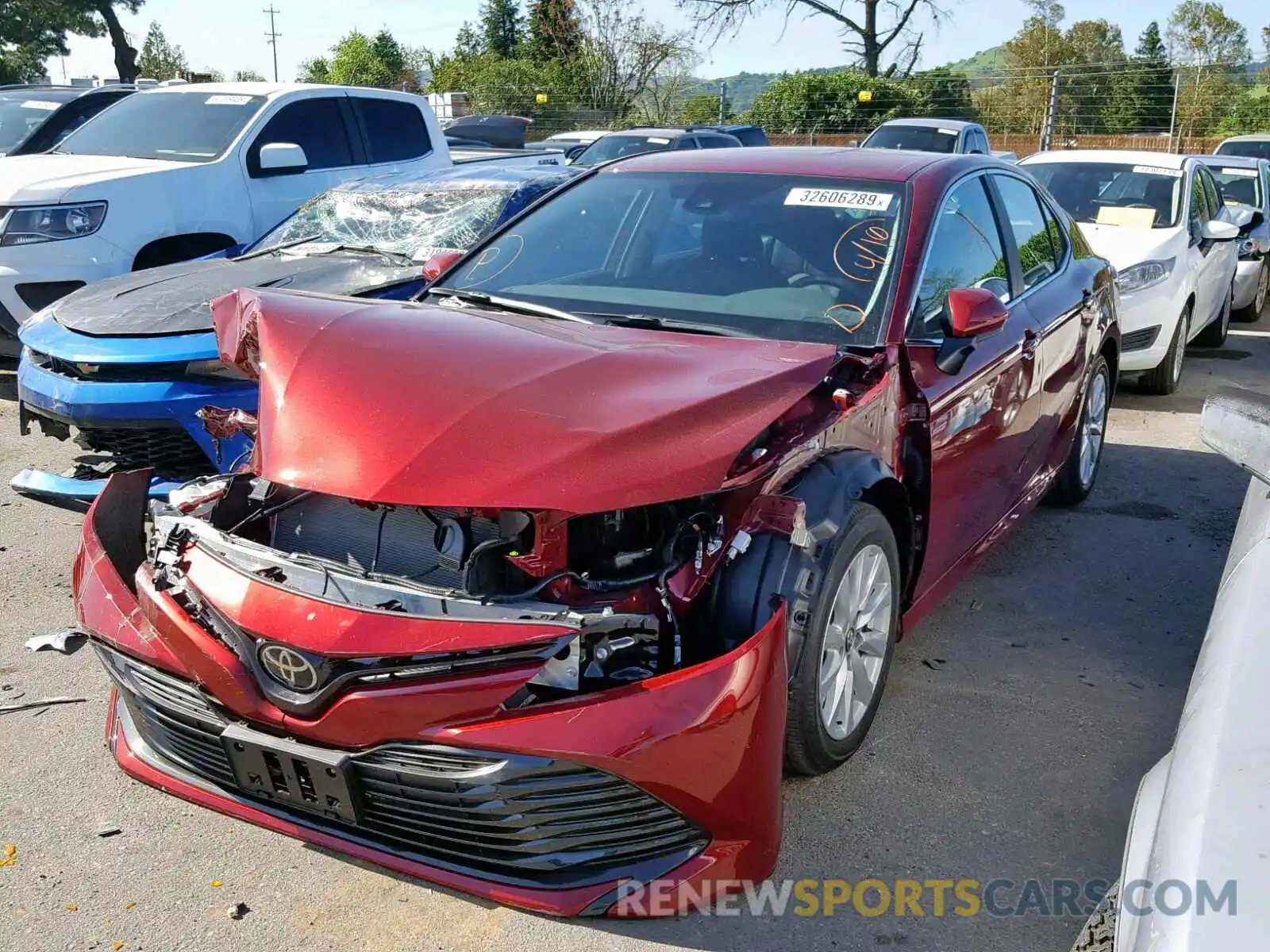 2 Photograph of a damaged car 4T1B11HK8KU731851 TOYOTA CAMRY 2019