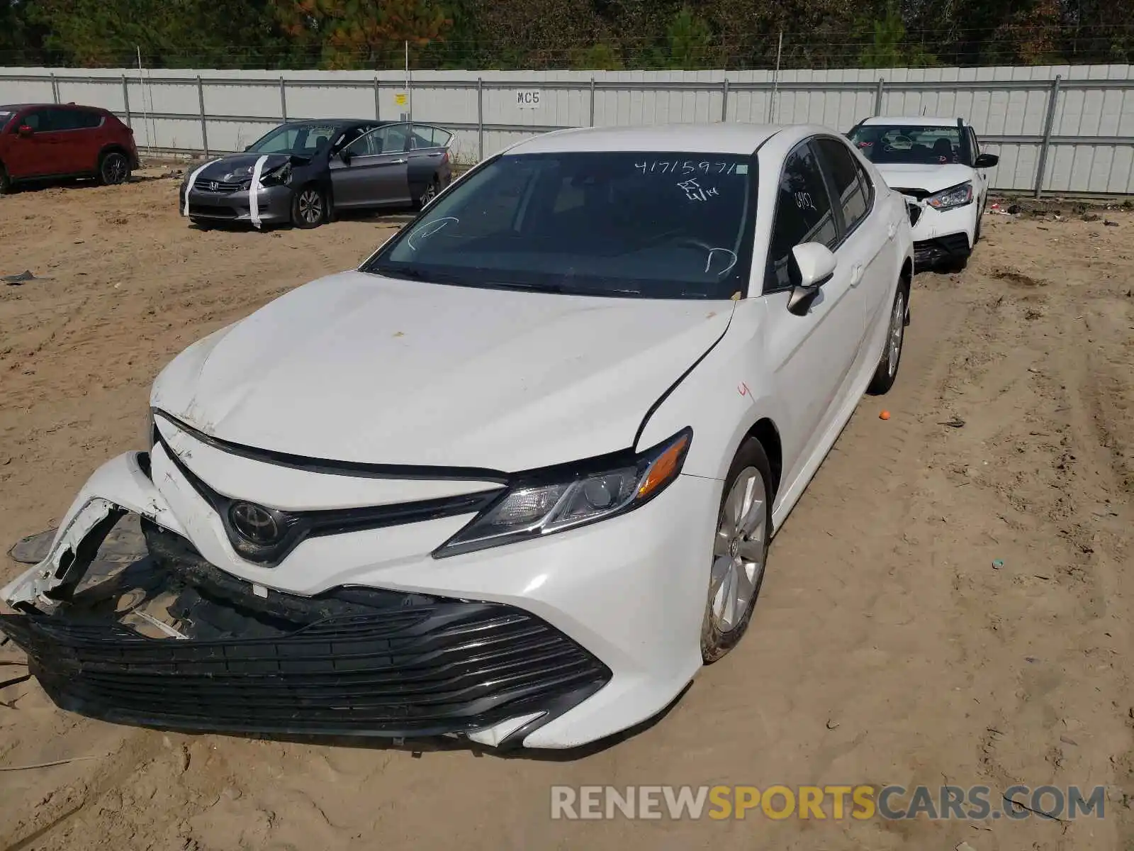 2 Photograph of a damaged car 4T1B11HK8KU738377 TOYOTA CAMRY 2019