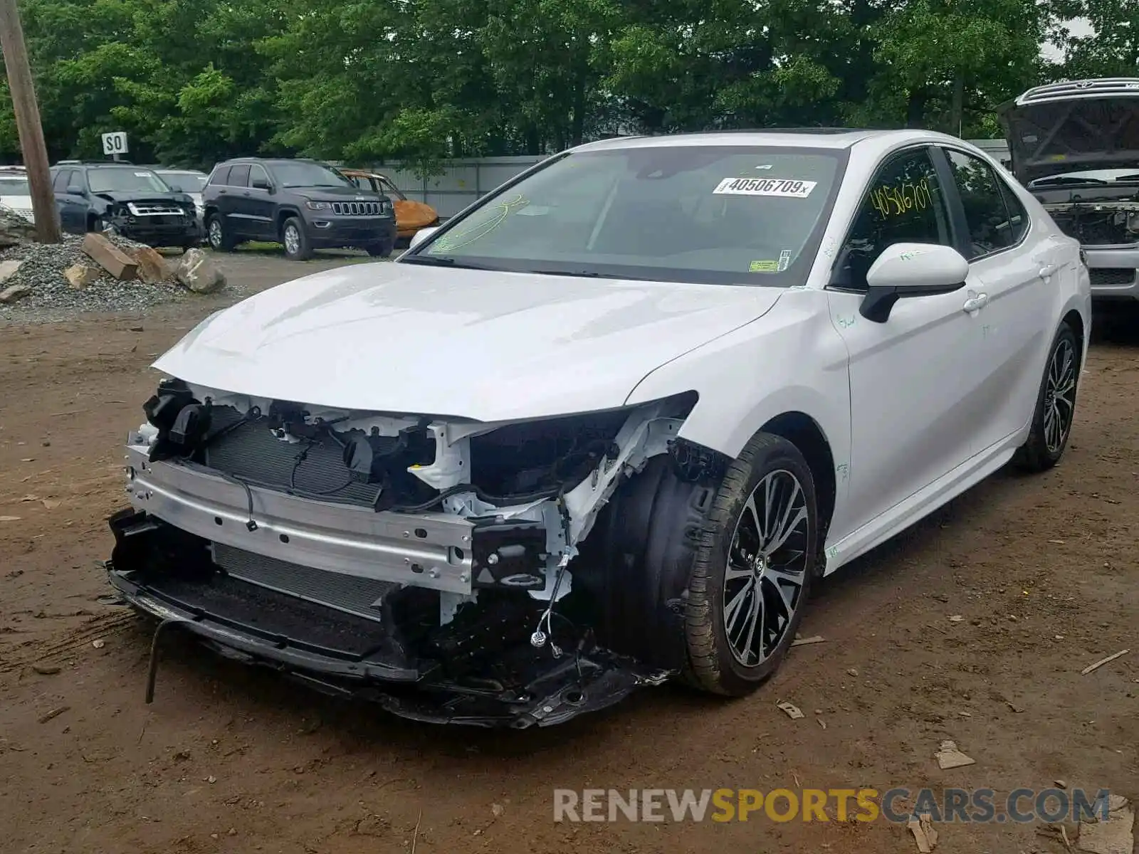 2 Photograph of a damaged car 4T1B11HK8KU743885 TOYOTA CAMRY 2019